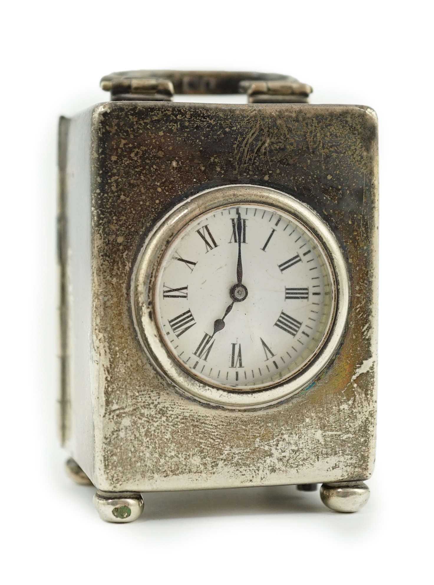 An Edwardian silver miniature carriage timepiece, by William Comyns